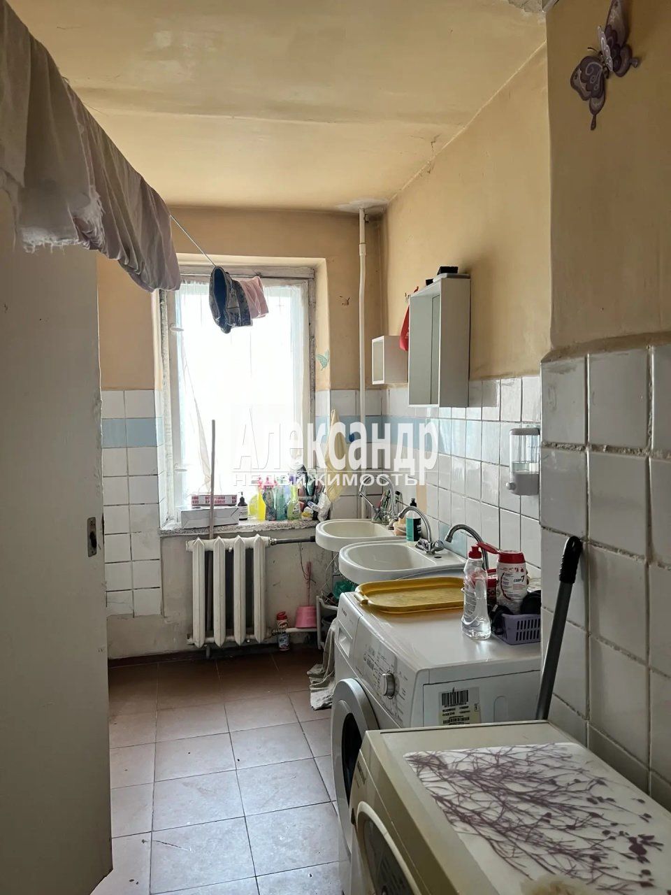 Комната в 12-комнатной квартире (232м2) на продажу по адресу Санкт-Петербург, Аэродромная улица, 7к4— фото 14 из 19